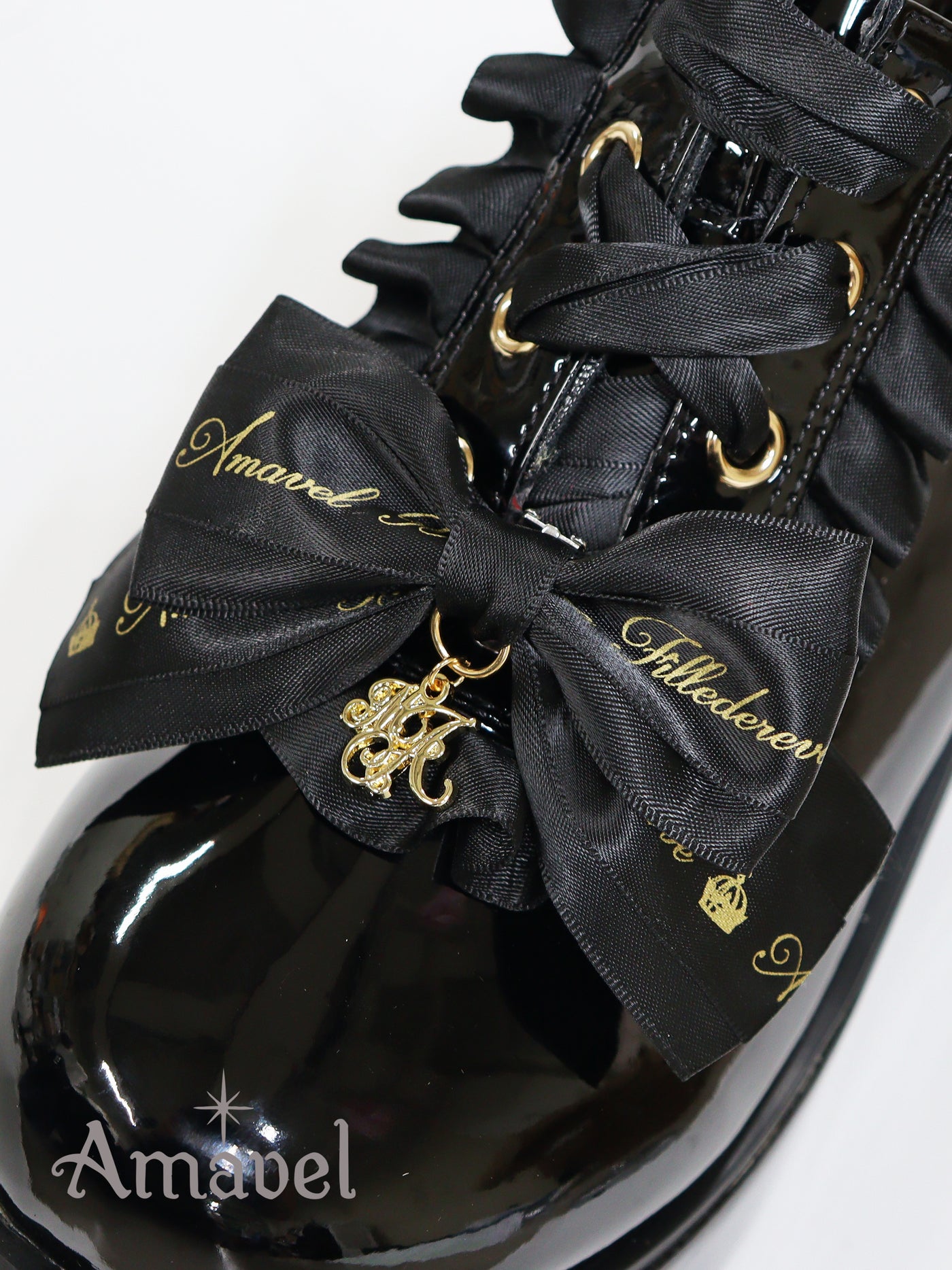 Frilled shoes with logo ribbon