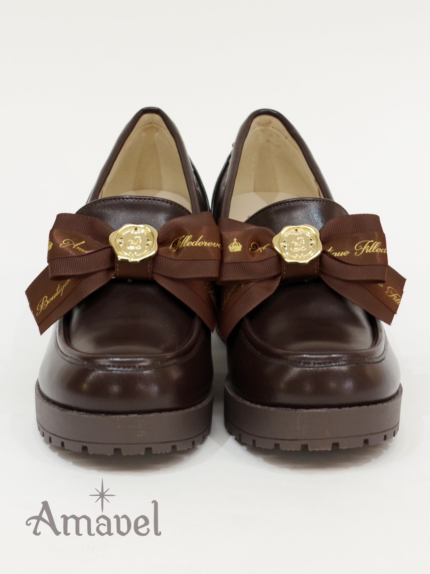 Loafer pumps with message ribbon