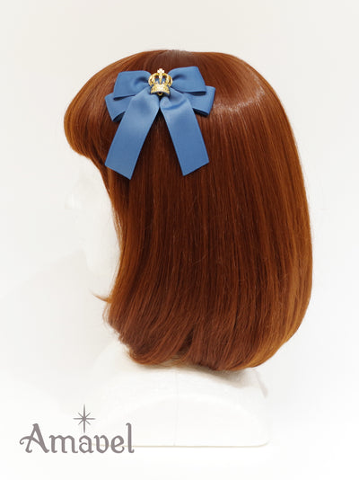 Double ribbon clip with crown charm