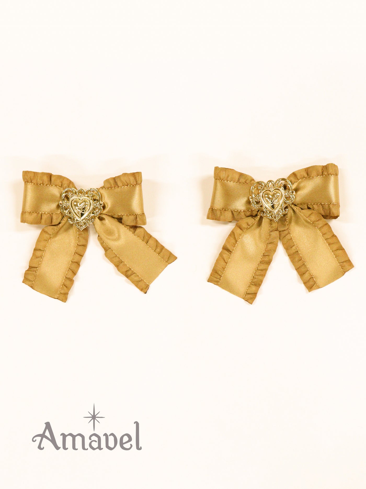 Frilled ribbon clip with heart charm